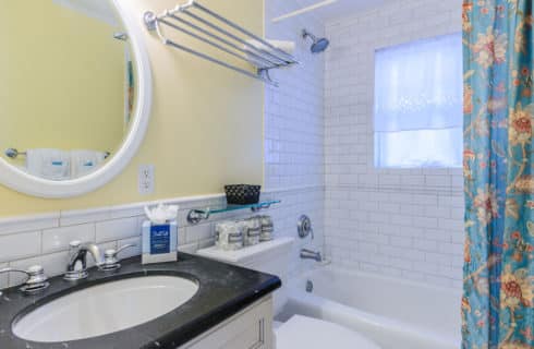 Poolside Studio Villa bathroom with shower and tub